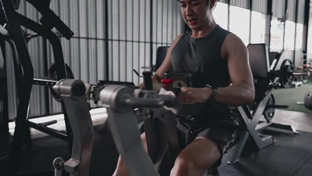 Pec Deck Fly Machine, Men exercise to increase chest muscles, Building Forearm Strength, Bodybuilders Intense Gym Workout with Weight Machine.