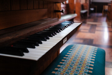 Keyboard of a small organ in a church.