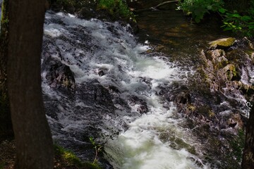 rushing stream at Rhaeadr Nantcol Waterfalls, UK
