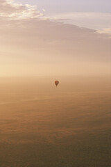 Hot air balloon at dawn over the Red Centre of Australia, Northern Territory