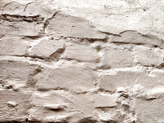 Old vintage background and texture with bricks and white plaster. Abstract background, texture, frame, place for text and copy space