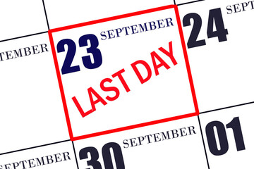 Text LAST DAY on calendar date September 23. A reminder of the final day. Deadline. Business concept.