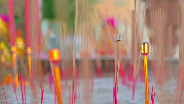 incense burner at tample in Thailand.Incense stick in the old tample.People use incense for Buddhist worship.