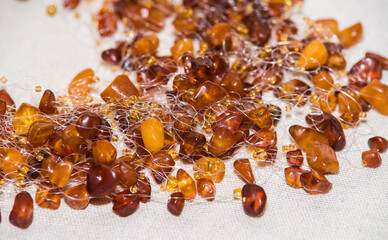 Jewelry made of natural amber stones. Selective focus.