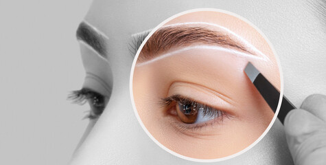 Brunette teenager girl having Permanent Make-up Tattoo on her Eyebrows. Eyelash artist plucks...
