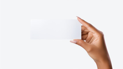 Fototapeta premium A woman's hand holding a blank