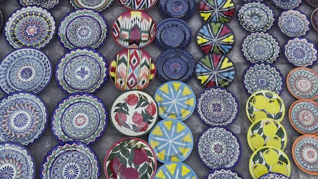 Ceramic national Uzbek dishes. Slow motion video.