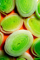 Extreme close up of colorful leeks.