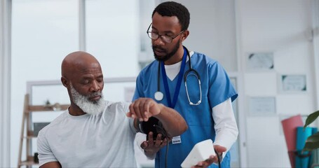 Blood pressure, healthcare and a black man with a doctor and a machine at a hospital for a check. Medical, consultation and an African male nurse with a patient and equipment for hypertension - Powered by Adobe