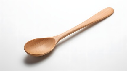 small and simple spoon on a table, white background