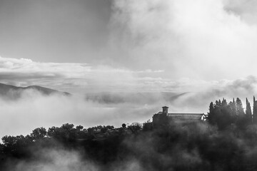 Mist and fog between valley and layers of mountains and hills in Umbria Italy