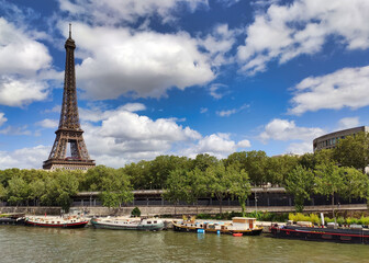 Fototapeta premium Eiffel tower and Seine river, seen from Bir-Hakeim bridge, Paris, France