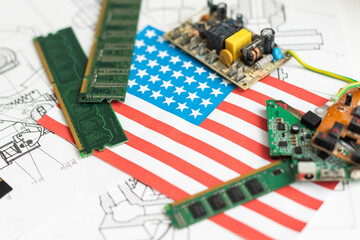 Fototapeta na wymiar The flag of the United States of America on the CPU processor or GPU chip on the motherboard. America is the world's largest producer of chips, demonstrating the country's superiority