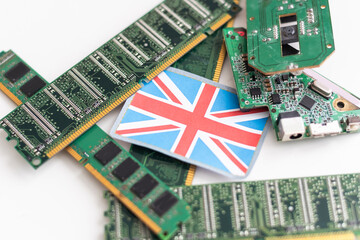United Kingdom flag in the center of a circuit board. Concept of leadership in technology,...