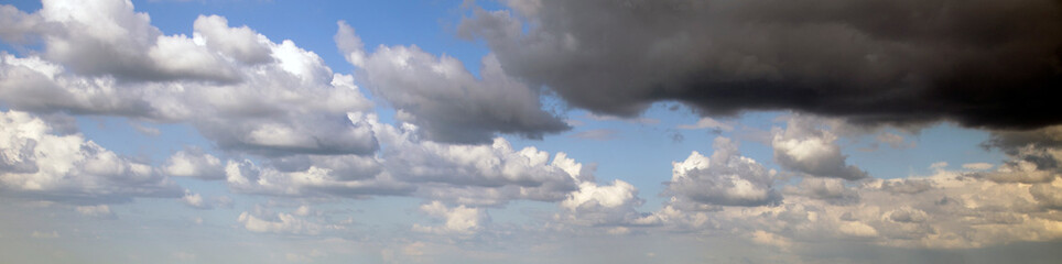 Fototapeta na wymiar Stormy clouds flying