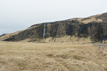 tall waterfall in the distance