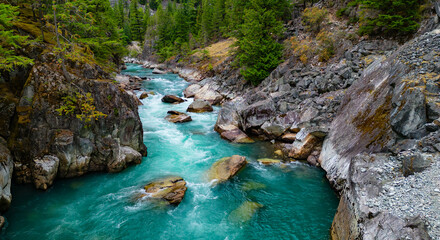 River in a Rocky Mountain Canyon. British Columbia, Canada. Aerial Nature Background