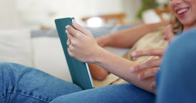 Couple, hands and relax with tablet in home for online shopping, streaming multimedia and search internet. Closeup, people and scroll on digital technology, social media app or subscription on sofa