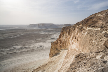 Fototapeta na wymiar Panorama of hills and ridges with limestone and chalk slopes in the Kazakh steppe, relief folds in the desert tract of Boszhira