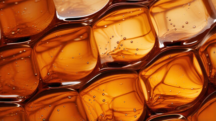 A sticky viscous texture of fresh pure maple syrup is highlighted in sharp detail its thick form filling the air to create unique patterns as it cascades to its destination.
