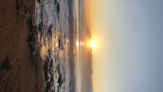 Alicante, Spain - March, 201: Beautiful sunrise above sea horizon in Spain. Vertical orientation FullHD footage