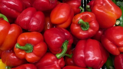 Fresh Red Bell pepper background. Layout with Red pepper. Pepper in the supermarket. - Powered by Adobe