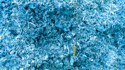 Wood-burning wallpaper, rough textured with a blue background