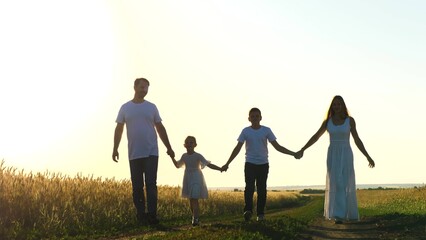 Fototapeta na wymiar mother father child daughter son walk sunset, holding hands parents girl boy, happy family, wheat field, childhood dream, fun kid, have fun outdoors, carefree childhood mother father, girl boy dreams