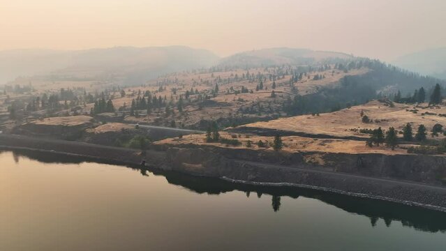 Smoke from seasonal wildfires hover over the the Columbia River Gorge, a federally protected scenic area forming the boundary between Washington and Oregon. 