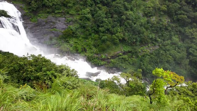  A Stunning Cascade name Malalli waterfall hidden in the deep rainforests of Western Ghats in the Monsoon season in Coorg district of Karnataka, India.