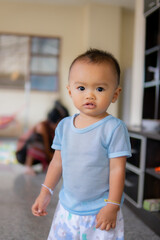 Portrait of boy playing in the house having fun