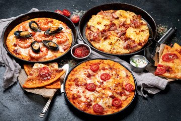 Freshly served various pizzas.