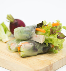 Salad roll isolated on white background, salad of fresh vegetables rolls	