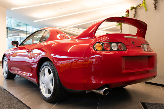 New York City, USA - July 23, 2023: toyota supra 1994 sports car red color, back corner view