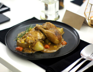 Aromatic roasted chicken and baked potato with rich mushroom sauce