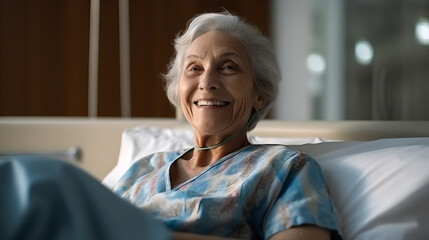 Fototapeta na wymiar Senior female patient smiling lying on a hospital bed, elderly people health care concept.