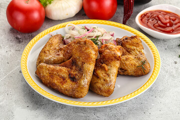 Grilled chicken wings with sauce
