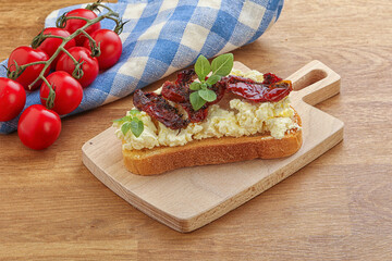 Bruschetta with soft cheese and tomato