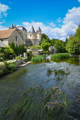 Fototapeta na wymiar Verteuil-sur-Charente is a village situated on the banks of the river Charente, in the quiet French countryside with a beautiful castel and water mills. High quality photo