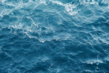 High angle shot of the Deep blue ocean with waves and ripples - obrazy, fototapety, plakaty