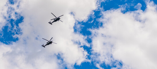 police helicopter. heli copter flight. helicopter transport. helicopter flying in the sky. two helicopter rotorcraft. copy space advertisement