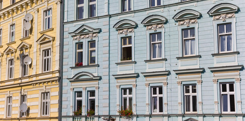Fototapeta na wymiar Panorama of colorful facades of apartment buildings in Karlovy Vary, Czech Republic