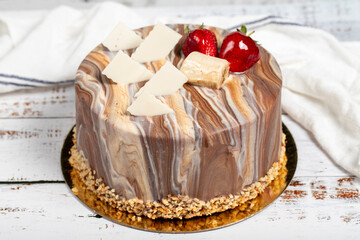 Birthday cake. Fresh delicious chocolate and fruit cake on a white background