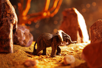 Elephant in a rocky gorge at night.