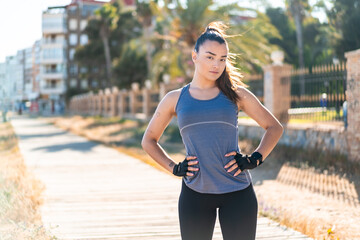 Young pretty sport woman doing sport