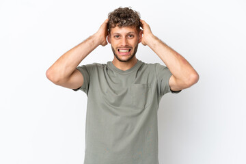 Fototapeta premium Young caucasian handsome man isolated on white background doing nervous gesture