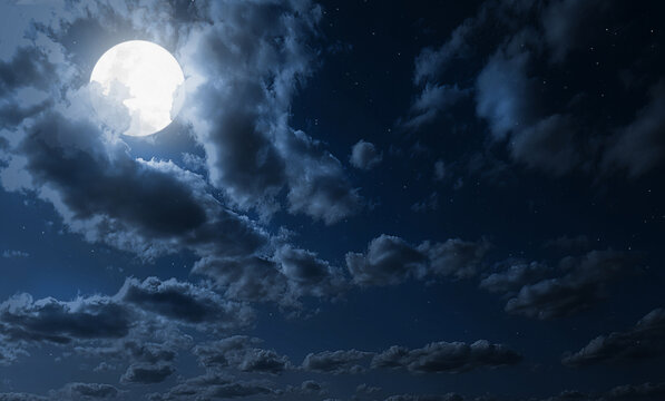 Romantic Moon In Starry Night Over Clouds