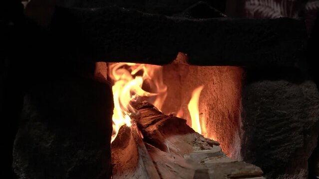 The production process of organic palm sugar which is processed in a traditional kitchen. The manufacture of palm sugar starts with cooking using a stove &wood, then it is formed using coconut shells
