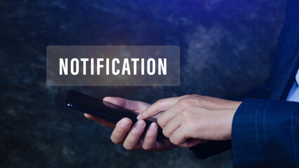 Businessman pressing button notification on smartphone virtual screens, business, technology, internet and networking concept.