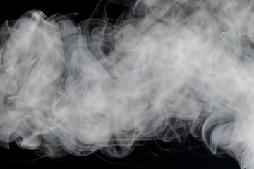 Beautiful white smoke with natural pattern on black background with charming pattern